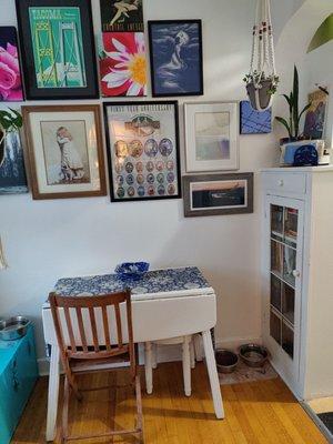 My dining area...original wood floors and every window frame is a window seat!