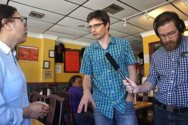 Matthew Peddie and Brendan Byrne of WMFE on the scene at King Cajun Crawfish