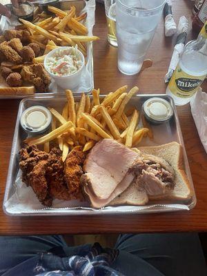3 meat combo with turkey, pork, chicken tenders and fries