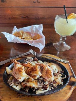 Chef special. Chicken and shrimp and steak, bacon, onions and peppers... oh my.