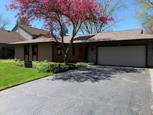 New roof and Gutters after Hail Damage