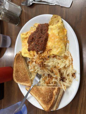 Spanish omelet, very good. Came the toast of choice, jelly and a pile of hashbrowns. The salsa on top of the omelet was tasty too.