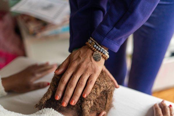 In-home Reiki treatment with meditation.