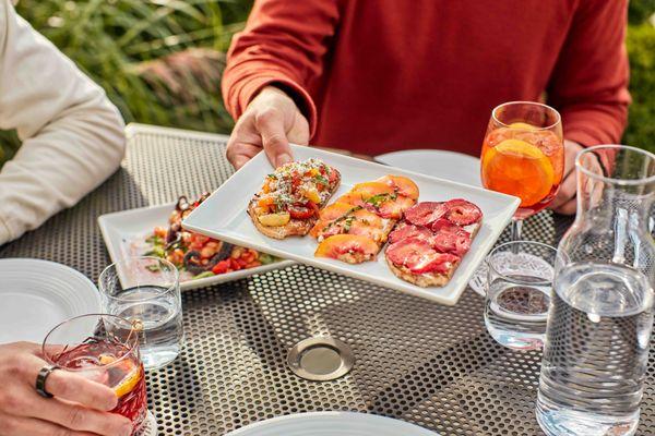 Outdoor dining with starters at Terrace Room.