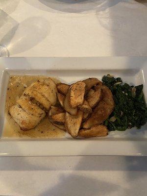 Crab stuffed flounder, shaved potatoes, spinach with minced garlic and olive oil.