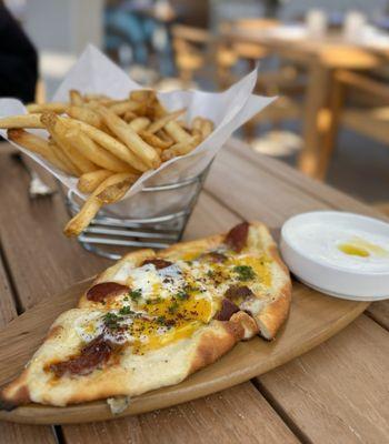 Sujuk Pide: Spicy sujuk sausage, kasar cheese, 65° egg ($16) + Zaytinya Fries w/ house mushroom salt, roasted garlic yogurt ($9)