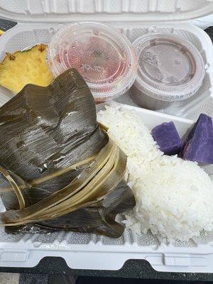 Pineapple, lomi salmon, poi, rice, purple leaf potato (I actually don't know) , Lau Lau wrapped in tea leaf