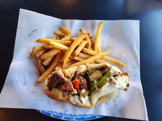 Philly cheese steak and fries.