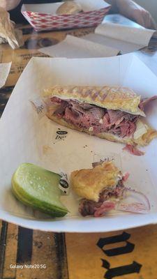 Roast beef sandwich with a grilled bun.