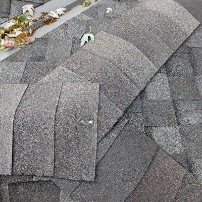 Exposed nail on top of ridge