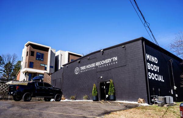 Outside the treatment center with sober living in the backgroung.