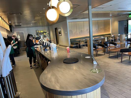 Staff is slammed with) drive thru orders but no one in the nice large store