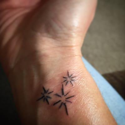 Alpha-Omega tattoos and piercing