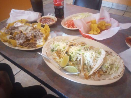 Shrimp tacos. Beef nachos. Chips and salsa.