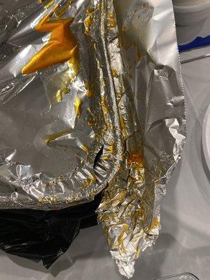 Poorly packaged, ripped at the corner, covered with another aluminum foil.