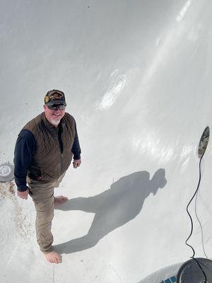 Steve Pool, Owner putting the finishing touches on our pool bright and early on a Saturday Morning.