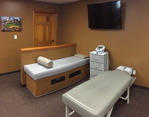 Ultrasound/muscle stim and roller bed