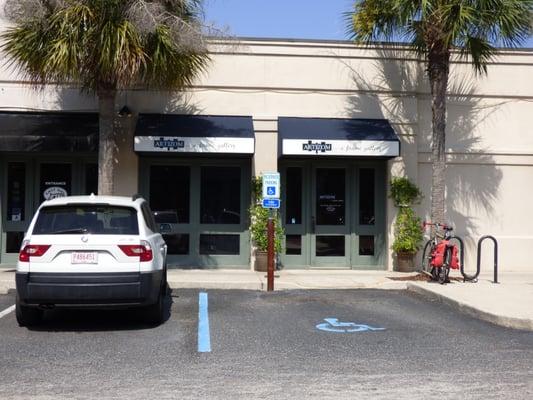 Artizom frame shop - ,in shopping center off East Bay St. near Calhoun St. - Very limited parking - only one entrance & exit.