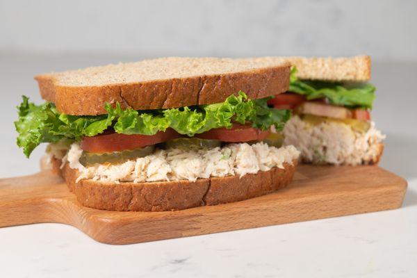 Chicken Salad sandwich. One of our popular known sandwiches. Chicken breast mixed with carrots, celery, and dill.