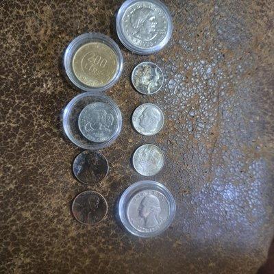 Susan B Anthony silver dollar wide rim and 200 LIRE 1978 three dime the top one and bottom one are error coins two 1982D small date 2005
