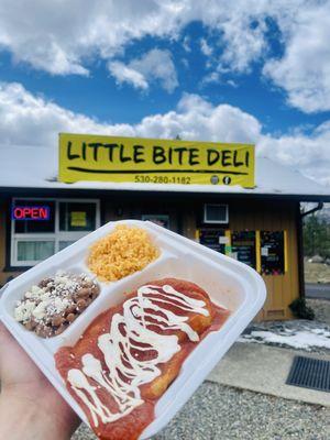 Our Famous Chile Relleno plate ; Housemade creamy red tomato sauce , sour cream , with a side of rice and beans 