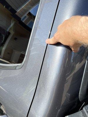 2022-06-08: Buff marks like these in the clear coat all over both doors, body and front fender.