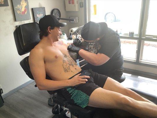 Forbidden Fruit Tattoo and Piercing