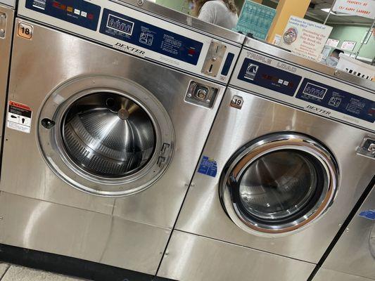 Washer on left missing door, on right not working.