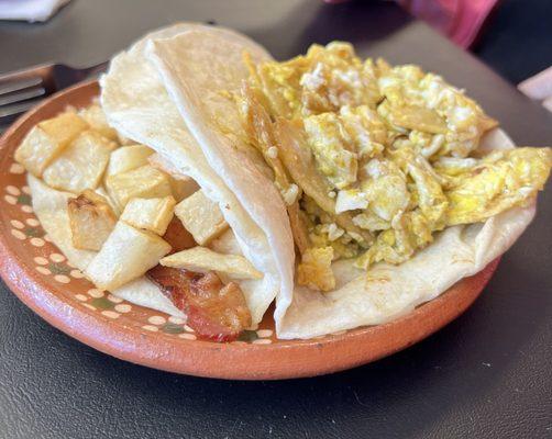 Potato with bacon & Chilaquiles with green chili