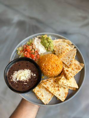 Chicken Quesadilla server with Rice and beans