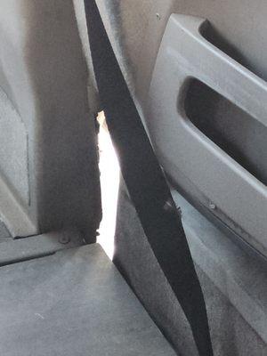 View of the road from inside. Air conditioning via sliding van door Worn out dash