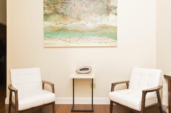 Waiting Area has educational books, herbal tea and water.