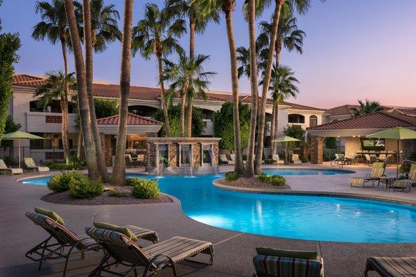 Sunset view of 24-hour lagoon style pool