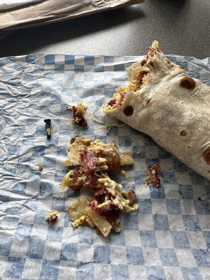 The burrito with the screw aside the food.
