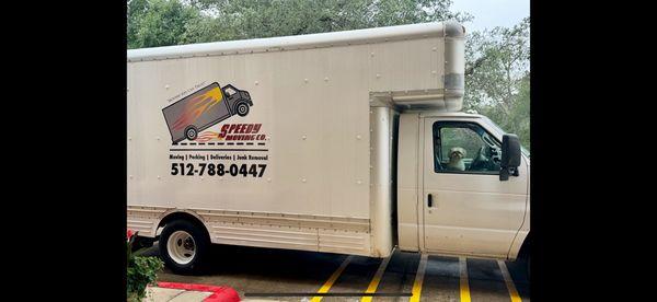 Trusty steed and our mascot in the window!