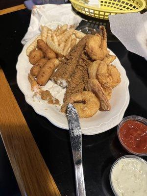 Catfish, shrimp, amazing hush puppies (I'm not a hush puppy fan) and French fries.