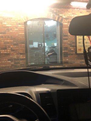 Lady in charge on her phone after starting vacuum while I asked a question