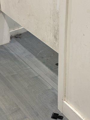 Filthy floors and doors in dressing rooms