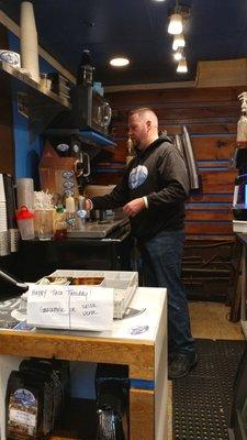 Making coffee at Boston Brewin Coffee