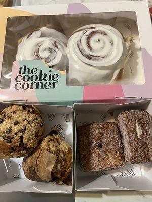 The famous cinnamon bun on the top. Muffins and cronuts in the bottom.