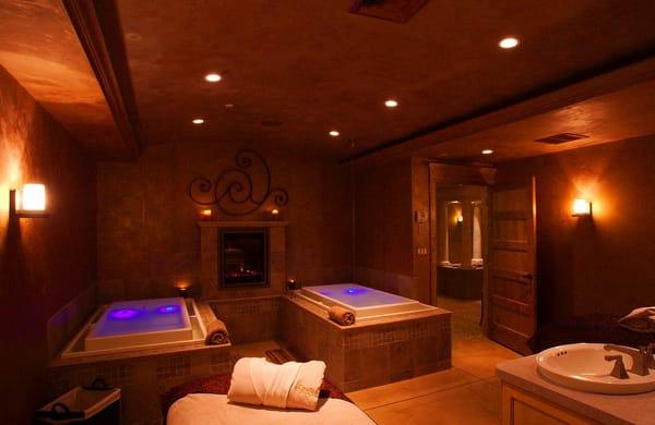 signature room featuring Kohler Sok Tubs