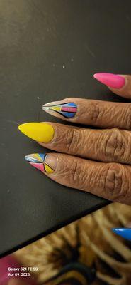 Fill-in and 2 nails repaired. Mary is amazing and she made up my designs after I showed her a picture ! Thank Ooooo Mary!