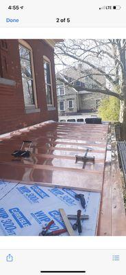 COpper standing seam roof, in progress
