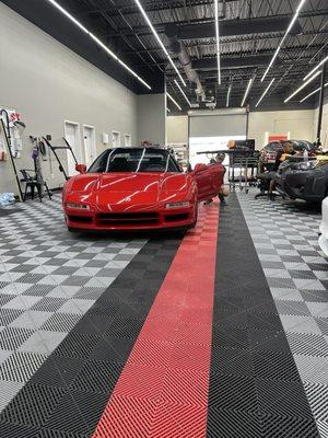 Acura NSX getting a door ding removal with its all aluminum body.