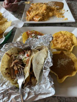 Carnitas and enchiladas.