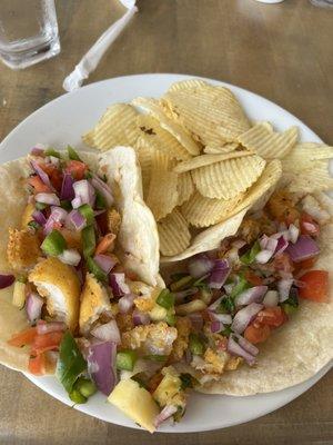 Fried fish taco with pineapple salsa and no cotija cheese with chips