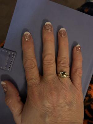 Beautiful pink sparkly polish with white french tips!