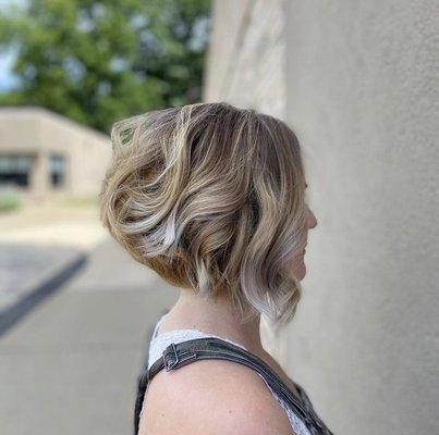 Women's layered bob with a dimensional pop of color