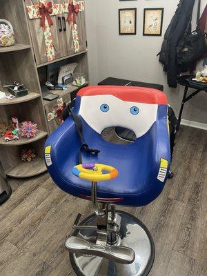Funny little kid shared to sit on during the haircut.