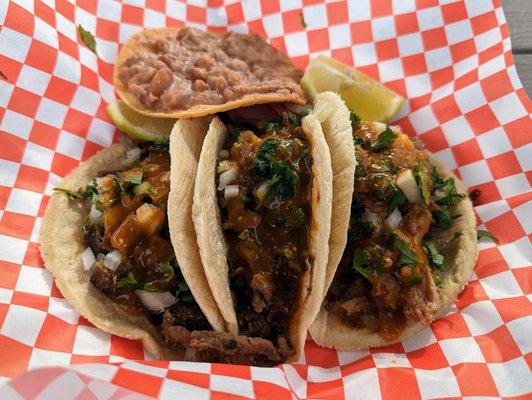 3 tacos with a free bean tostada